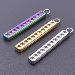 Detailed macro view of 18k plated stainless steel rectangle pendants for DIY jewelry