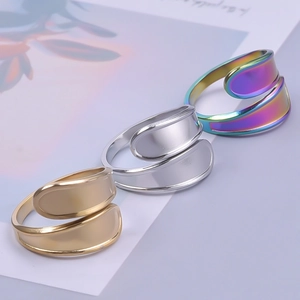 Minimalist adjustable stainless steel rings in gold, silver, and iridescent mirror finishes