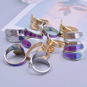 Minimalist adjustable stainless steel leaf rings in silver gold and rainbow finishes