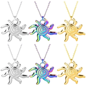 Three sun totem pendants in gold, silver, and rainbow colors with wave rays