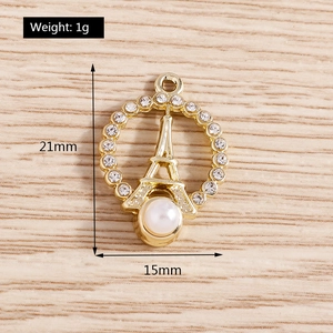 Detailed size specifications of golden Eiffel Tower charm with rhinestones and pearl
