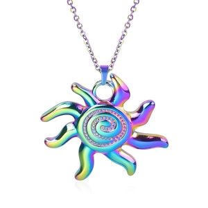 Macro view of sun-shaped pendant in rainbow plating finish with spiral texture
