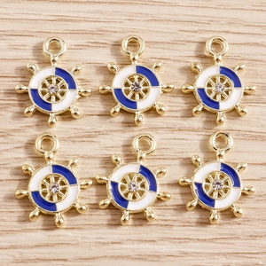 Set of 6 gold alloy nautical ship wheel pendants with blue white enamel and zircon stones