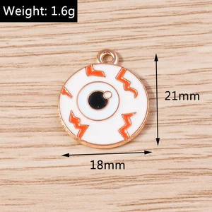Vue détaillée montrant les dimensions du pendentif œil Halloween 21mm et le poids 1,6g
