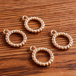 Set of 4 gold twisted rope design alloy charms for DIY jewelry and accessory making