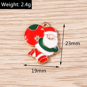 Enamel Santa Claus charm with green gift bag showing dimensions 23mm by 19mm and 2.4g weight