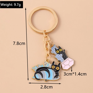 Detail of black cat enamel keychain with measurements showing 9.7g weight and 7.8cm height