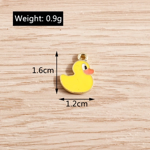 Detail view showing dimensions of a yellow duck enamel pendant for DIY jewelry