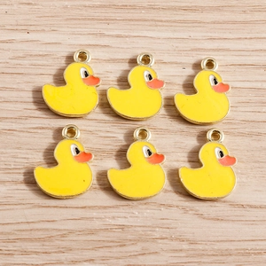Set of six yellow enamel duck charms with golden finish for DIY jewelry and necklaces