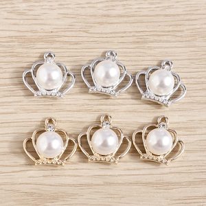 Luxurious crown jewelry pendants with faux pearls and rhinestones in gold and silver