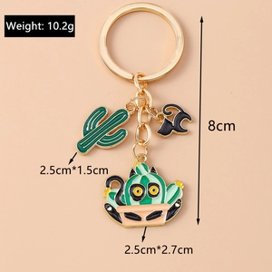 Detailed size and weight view of a cute cartoon cactus cat keychain with golden metal chain