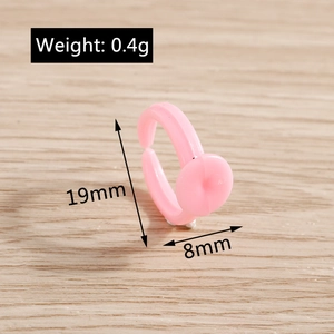 Close-up of pink plastic kids ring showing 19mm height and 0.4g weight details