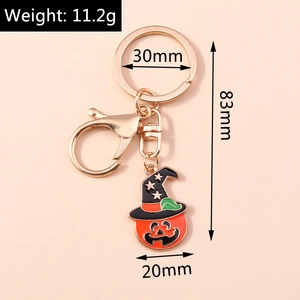 Detail showing dimensions of Halloween pumpkin witch hat keychain with gold clasp