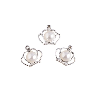 Three elegant crown pendant charms with white pearls and rhinestones on white background