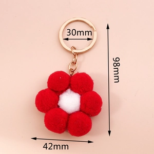 Detail view of plush flower keychain with dimensions 42mm width and 98mm total length