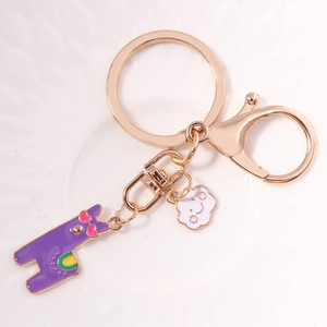 Cute purple llama keychain with pink heart sunglasses and small white cloud pendant