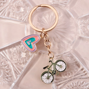 Porte-clés vélo et cœur multicouche en alliage avec anneau en métal doré élégant