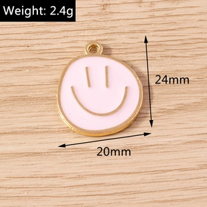 Detail of pink enamel smiley face pendant with gold plating and 20mm x 24mm measurements