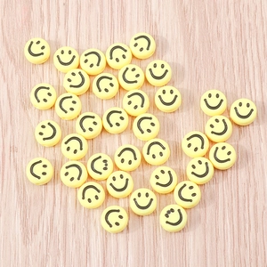 Perline rotonde gialle con faccina sorridente per gioielli fai da te e hobby