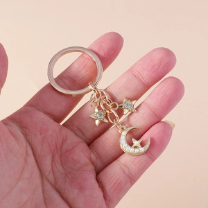 Mode Gold Legierung Stern Mond Schlüsselanhänger Mit Strass Künstliche Perlen Akzenten Luxus Tasche Anhänger Damen Trendiger Schmuck
