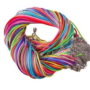 Colorful waxed cord necklace set with lobster clasps and extension chains on white background