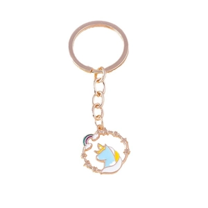 Cartoon unicorn keychain with star ring and rainbow cloud on a white background