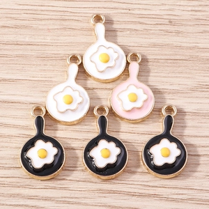 Detail of cute fried egg pan alloy charms for DIY jewelry making in black, pink and white