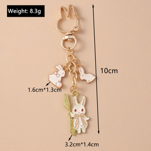 Détails du porte-clés lapin mignon montrant les dimensions de 10cm et le poids de 8,3g