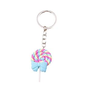 Colorful spiral lollipop keychain with blue bow and silver metal ring for backpack deco