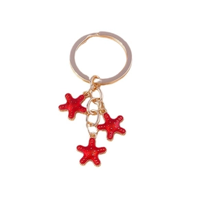 Porte-clés étoile de mer rouge avec anneaux dorés et breloques émaillées pour sacs