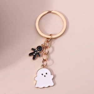 Porte-clés Halloween avec squelette pain d'épices noir et pendentif fantôme blanc