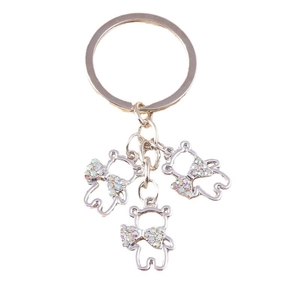 Chic silver hollow bear keychain with sparkly diamond bows on a round metal ring