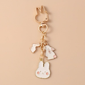 Détails de breloques lapin mignon avec fermoir doré et pendentifs en émail rose