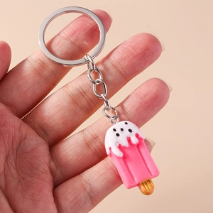 Handheld ice cream keychain featuring a pink and white resin design with a silver ring