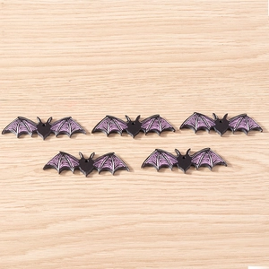 Detailed view of 5-piece set of Halloween bat resin charms for DIY handmade jewelry