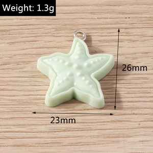 Macro detail of a 1.3g light green resin starfish pendant for DIY jewelry making