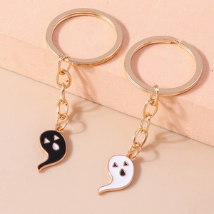 Cute cartoon Halloween ghost keychains in black and white with gold plated alloy rings