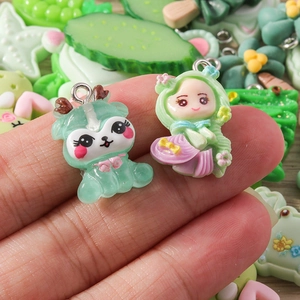 Detailed macro view of colorful cartoon resin charms for DIY jewelry making
