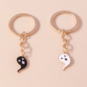 Set of two cute cartoon ghost keychains in black and white with gold alloy rings