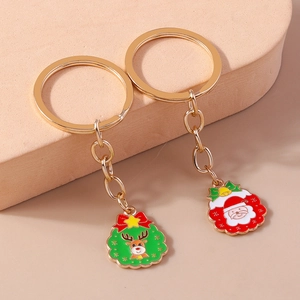 Set portachiavi natalizi con Babbo Natale e renna smaltati su anello in metallo oro