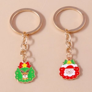Set portachiavi natalizi a cartone con ciondoli a forma di renna e Babbo Natale
