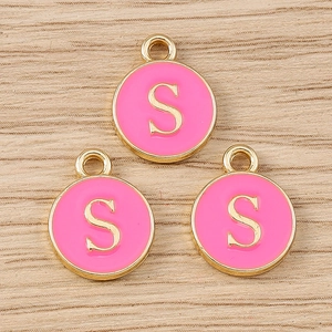 Detailed view of pink enamel alphabet S charms with golden edges for DIY jewelry