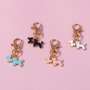 Colorful poodle dog and bone keychains with lobster clasp in four vibrant colors