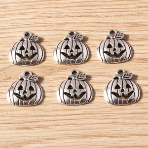 Set of six vintage silver pumpkin charms for Halloween DIY necklace and jewelry making