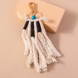 Portachiavi bohémien fatto a mano con perla turchese e nappa per decorazione borsa