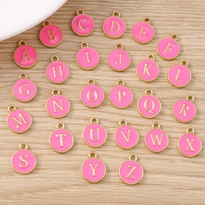 Set of 26 pink enamel alphabet letter charms with gold plating for DIY jewelry
