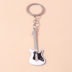 Detailed view of metal electric guitar keychain with black and white enamel finish