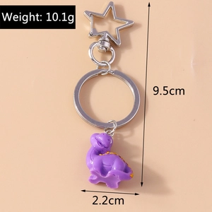Detail view of a purple cartoon dinosaur keychain with 9.5cm length and size markings
