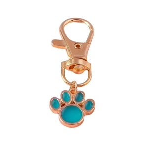 Cute gold cat paw pendant with green enamel and lobster clasp for pet lovers
