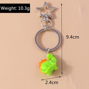 Detailed view of green dinosaur keychain with star clasp, showing 9.4cm size and 10.3g weight